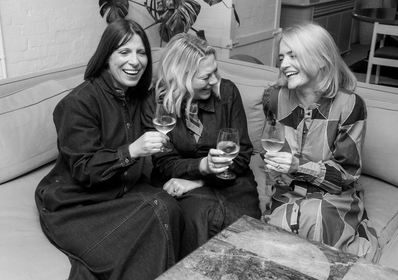 Curated Beauty founders laughing together