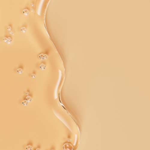clear liquid on orange background