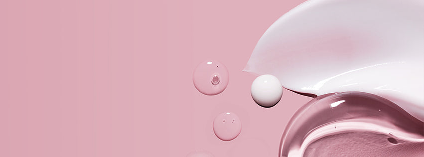 liquid droplets on pink