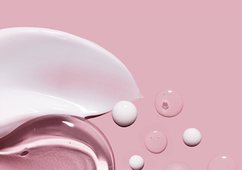 liquid droplets on pink